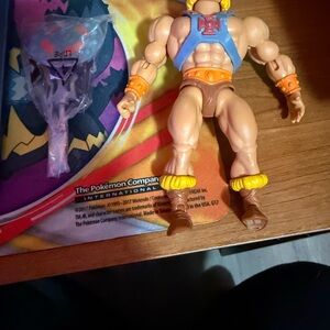 Mattel Action Figure with Blue and Brown Outfit